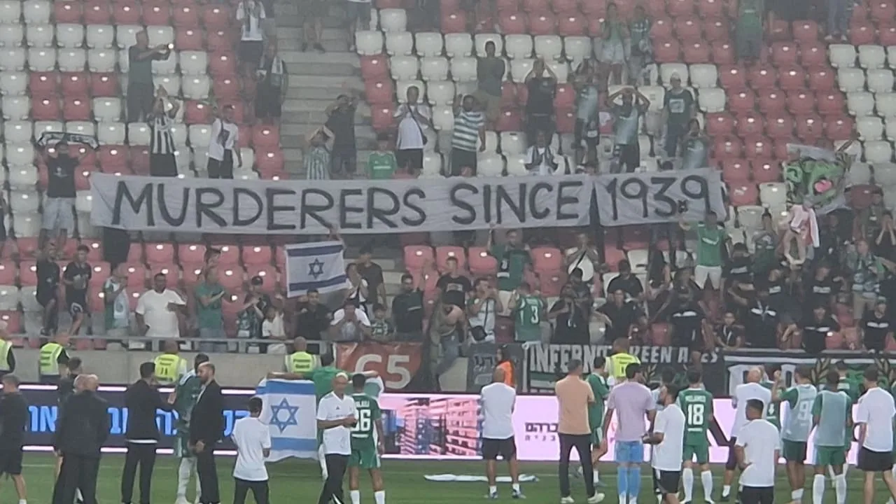image Israeli football fans cause outrage in Poland with &#8216;murderers&#8217; banner